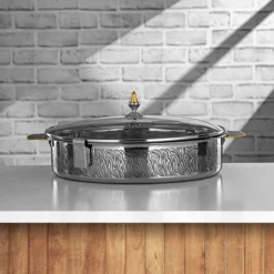 Almarjan Stainless Steel Hot Pot with a Glass Cover.